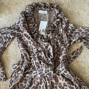 Never worn cheetah romper bell sleeve